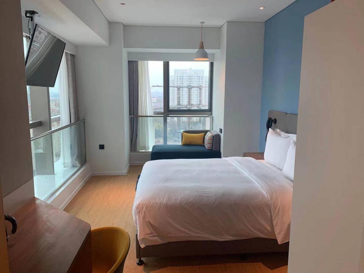 Holiday Inn Express Shanghai Baoyang By Ihg Exterior foto